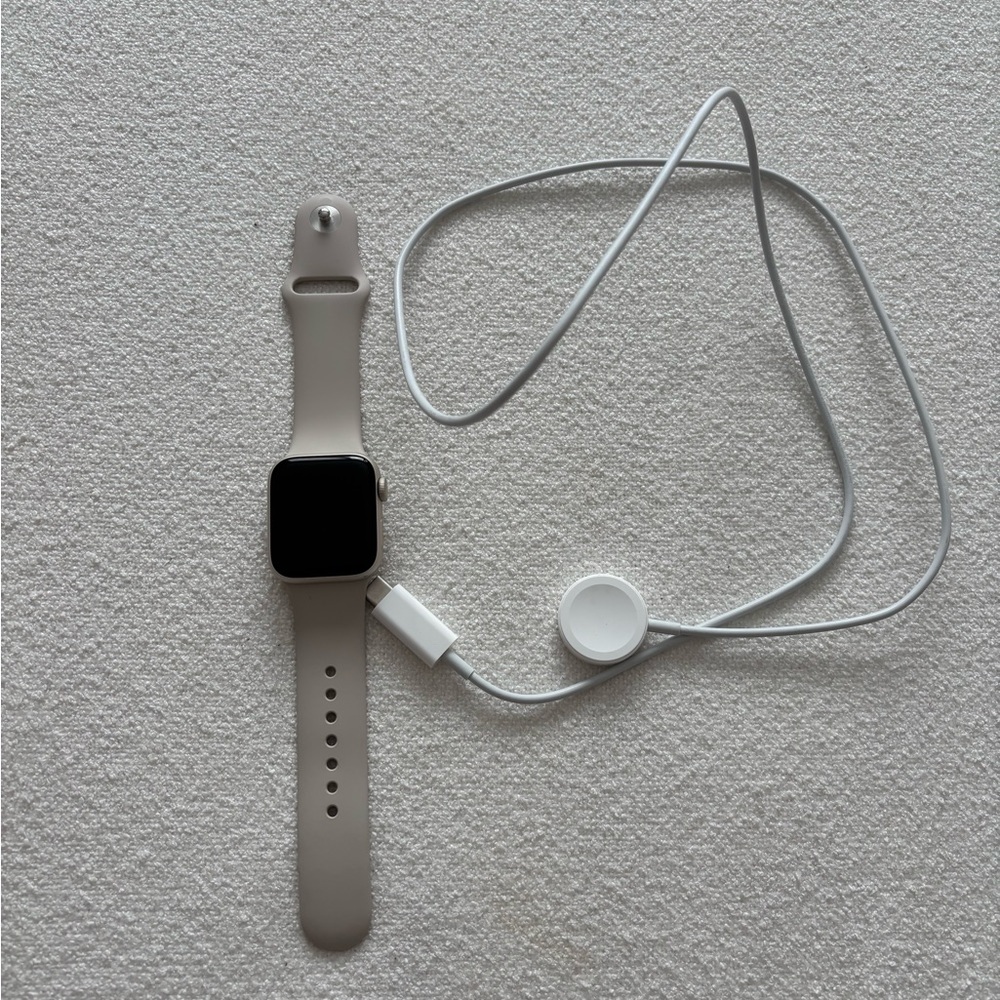 Apple Watch with Beige Band and Charger